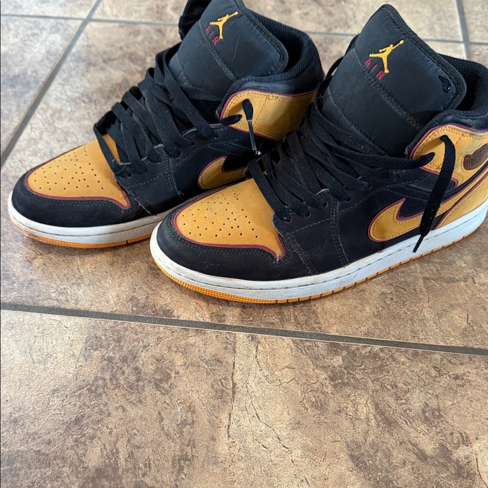 Nike Jordan Air High Top- Black and Gold High-Top Sneakers